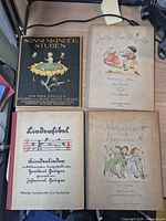 Übersicht aller vier Kinderbücher nebeneinander