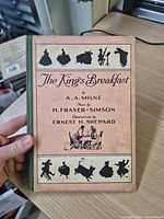 Front cover of 1925 The King’s Breakfast showing title, author, illustrator, publisher credit, and silhouette artwork
