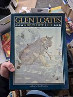 Front cover showing title, artist name and lynx illustration