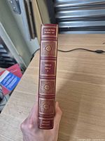 Spine showing title, author, Greystone Press device, Library Edition stamp