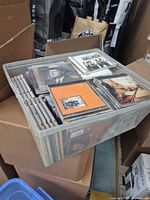 Top view of clear tote filled with CDs