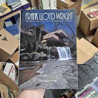 Front cover showing title, author and waterfall house image