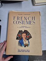 Front wrapper showing title, author, designer, publisher