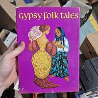 Front cover of book showing title and illustration, wear on edges