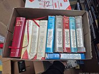 Top view of box showing eight hardcover volumes upright