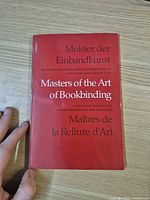 Front cover showing full trilingual title