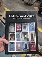 Front cover showing title, authors, and doorway images