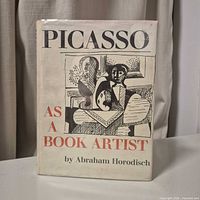 Front of book showing full dust jacket and title