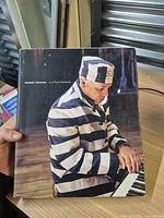 Front cover of photobook with dust jacket