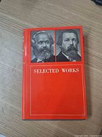 Front dust jacket showing portraits and title