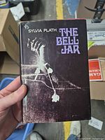 Front cover of The Bell Jar hardcover showing dust jacket artwork and title