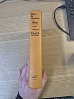 Spine showing title, author, publisher mark