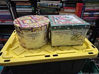 Cylindrical set and rectangular set, both sealed in plastic