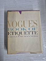 Front view of book with worn dust jacket