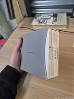 Slipcase showing spines of the four volumes