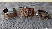 Overview of all three copper cuff bracelets