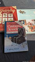All three jewelry reference books laid out