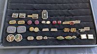 Full tray showing all cufflinks and tie bars