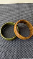Both Bakelite bangles side by side showing colors and shape