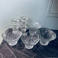 Group view of two bowls and two candlesticks