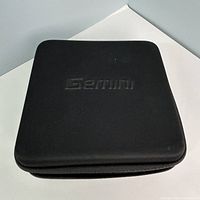 Closed black Gemini-branded hard case
