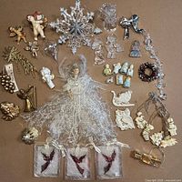 Overview of mixed angel and nativity themed ornaments and figurines