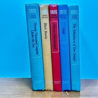Spine view of all five Children’s Classics hardcovers