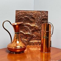 Group shot of plaque, pitcher and match holder
