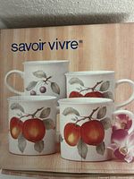 Retail box front showing Savoir Vivre Luscious mugs imagery