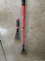 Both Bond rakes side by side showing size difference