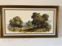 Front view of framed landscape canvas print showing full artwork and frame