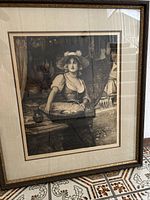 Full view of framed etching showing image, mat, and frame