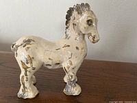 Left side view of ceramic Shire horse figurine