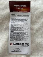 Thermophore Classic warranty leaflet showing brand and product line