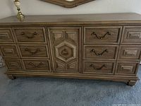 front view of dresser showing drawers and center cabinet