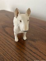 Front view of white Bull Terrier figurine