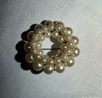 Front view showing faux pearl cluster design