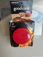 Front view of boxed Good Cook stuffed burger press