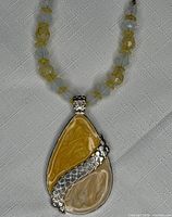 Close-up of pendant and bead section