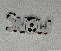 Front view showing painted design and lettering