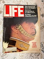 Front cover showing title, Prince Charles photo, Welsh Guards detail