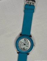 Front view showing dial, bezel and strap