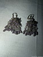 Front view of both purple bead chandelier earrings
