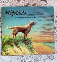 Front cover showing title, author, illustrator and dog on dune