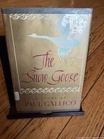 Front view of 1941 The Snow Goose hardcover showing title and illustration