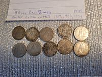 Ten Canadian dimes obverse sides visible