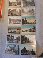 All 12 Hamilton postcards in sleeves