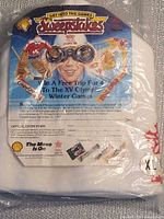 Front view of one hat in original Shell sweepstakes packaging, XL size shown