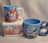 Both mugs and Through the Years box displayed