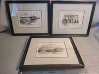 All three framed prints grouped together